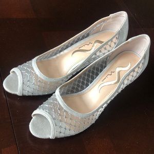 Women’s size 8 silver heals with rhinestones - worn once for a wedding